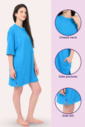 Woman wearing a bright blue nightshirt with close-up details on a light purple background