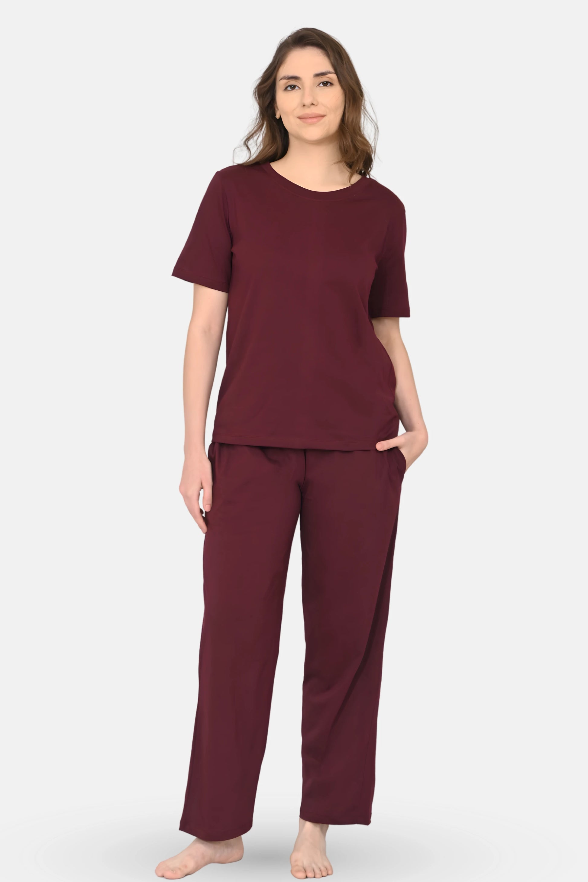 Woman wearing a wine pajama set