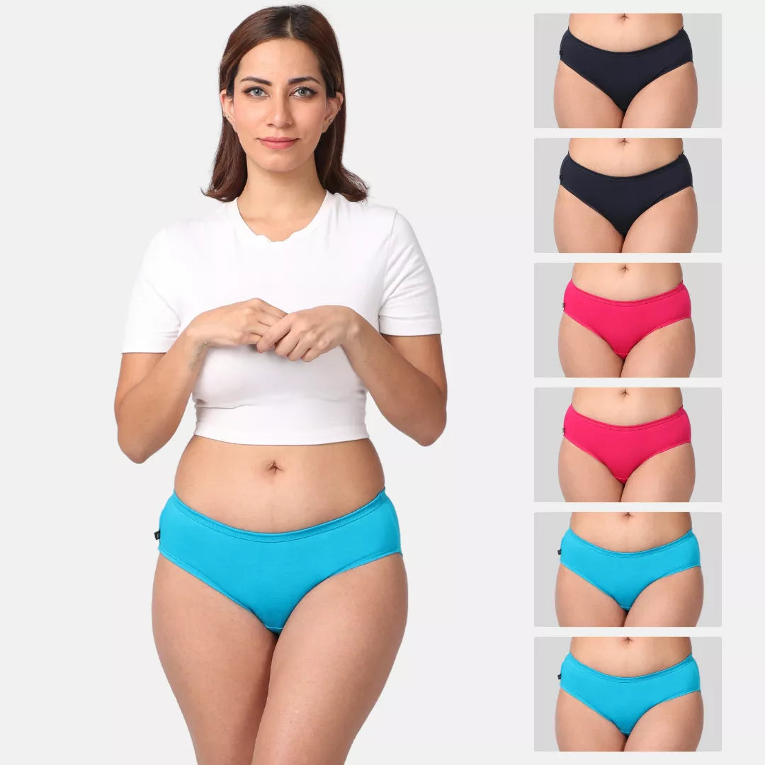 Woman wearing blue mid-waisted brief bottoms with inset images