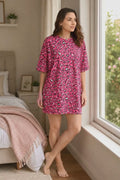 A video reference for women oversized tee shirt candy hearts aop